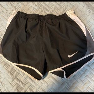 small black nike running shorts